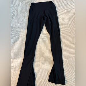 women’s Nike flared leggings with ankle slits